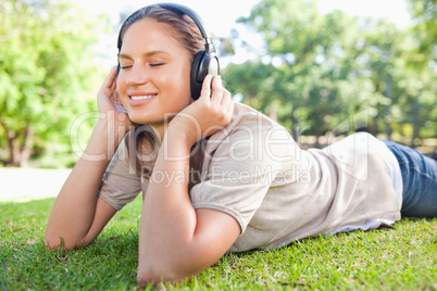 Woman enjoying music on the lawn