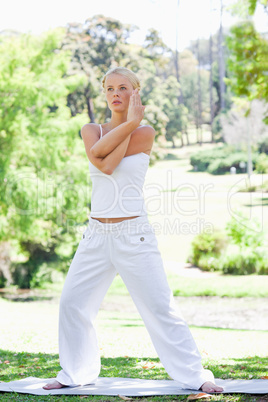 Woman doing stretches in the park