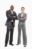 Business man and woman with hands crossed