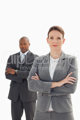 serious businesswoman in front of businessman