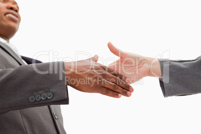 Businessman going  shaking a hand