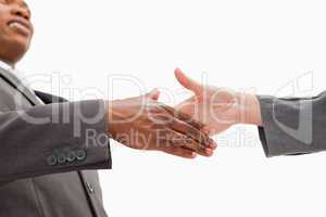 Businessman going  shaking a hand