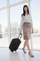 A business woman with a suitcase