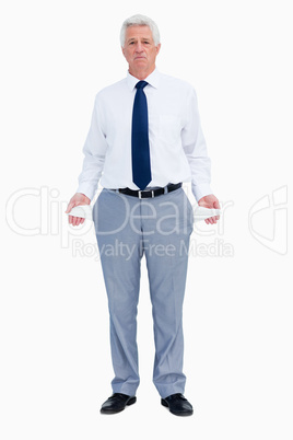 Portrait of a businessman with empty pockets