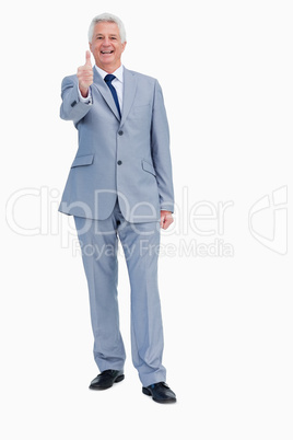 Portrait of a smiling businessman approving