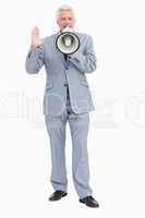 Portrait of a businessman speaking with megaphone