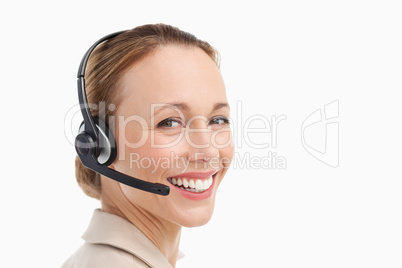 Portrait of a woman in a suit with headset