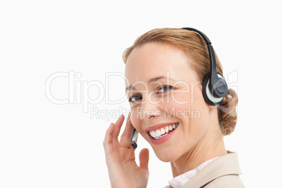 Portrait of a pretty woman in a suit with headset