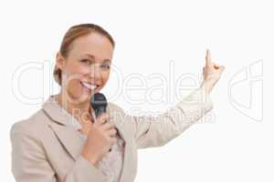 Portrait of a businesswoman in conference with a microphone