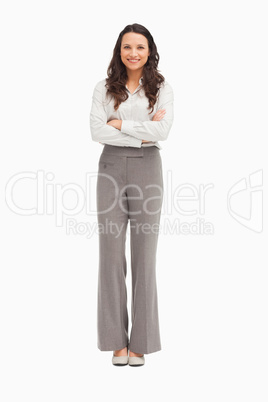 Pretty employee with folded arms