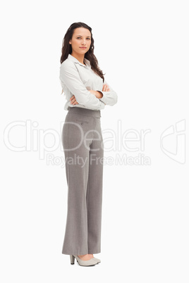 Portrait of a beautiful employee with folded arms