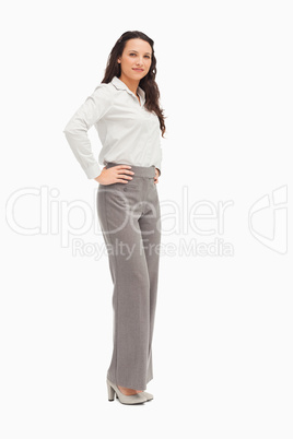 Portrait of an employee arms on hips