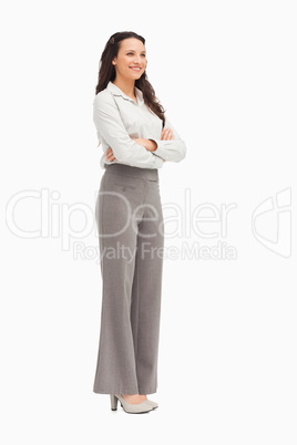 Employee standing with folded arms
