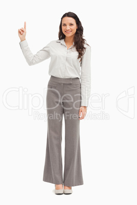 Portrait of an employee pointing up