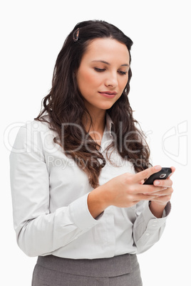 Close-up of a brunette texting