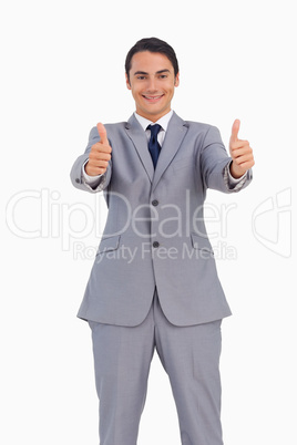 Smiling man in suit the thumbs-up