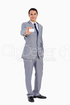 Good-looking man showing his business card