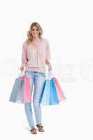 Full length shot of a woman carrying shopping bags