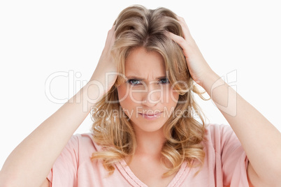 Young blonde woman looking at the camera Young blonde woman looking at the camera