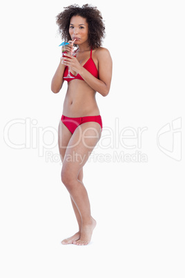 Attractive woman holding a cocktail