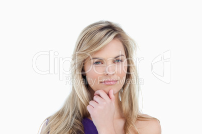 Serious blonde woman looking at the camera