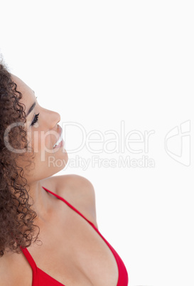 Smiling brunette woman looking away