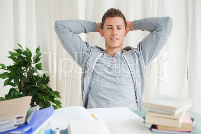 Portrait of a student stretching while looking away