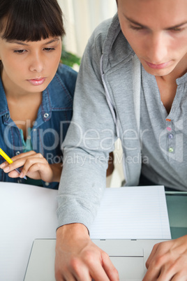 Close-up of two students doing homework