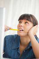 Student looks up while grimacing