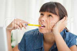 Student scratching her head for this homework