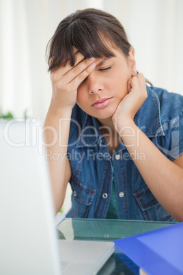 Female student having a headache