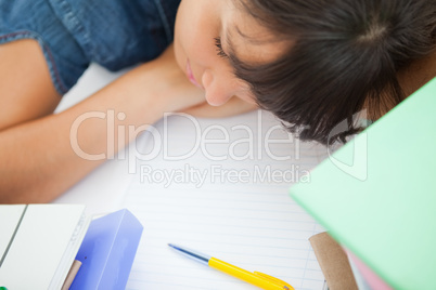 High shot of a female student sleeping