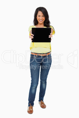 Latin student showing a touch pad screen