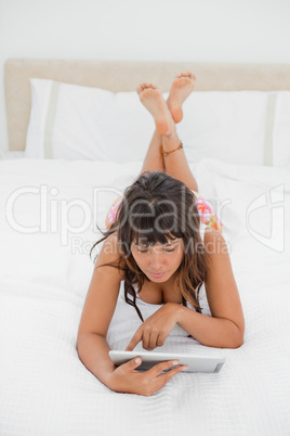 Young woman using a touch pad