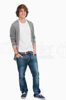 Male student posing hands in pockets