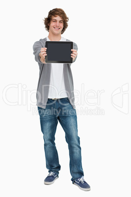 Male student showing a touch pad screen