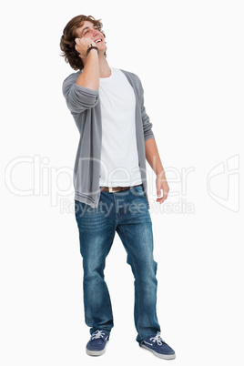 Male student laughing on the phone Male student laughing on the phone
