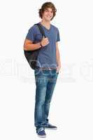 Smiling male student with a backpack