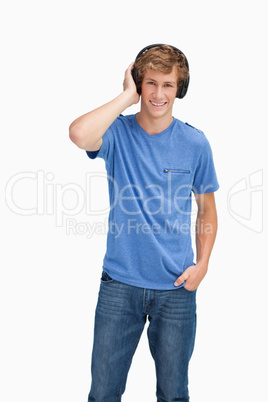 Smiling blond man wearing headphones