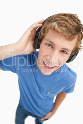 Fisheye view of a blond student wearing headphones