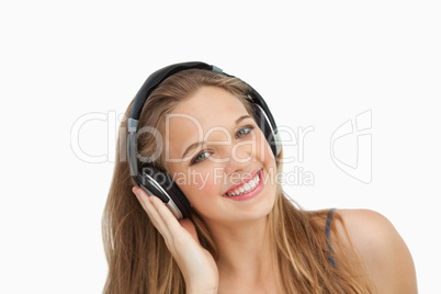 Close-up of a beautiful student wearing headphones