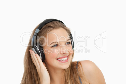 Close-up of a smiling student wearing headphones