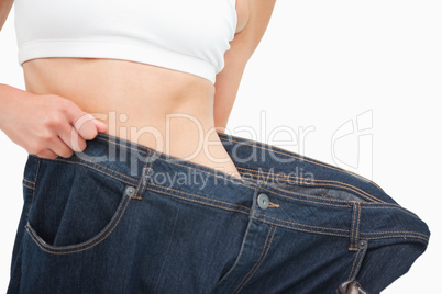 Close-up of a woman waist who lost a lot of weight