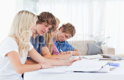 Students studying together at the table