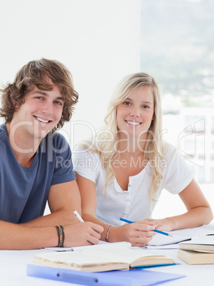 Close up of a smiling group of students looking at the camera