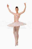 Ballerina with her arms risen