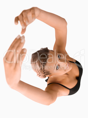 Overhead view of stretching woman