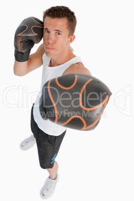 High angle view of punching boxer