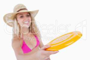 Frisbee held by an attractive woman
