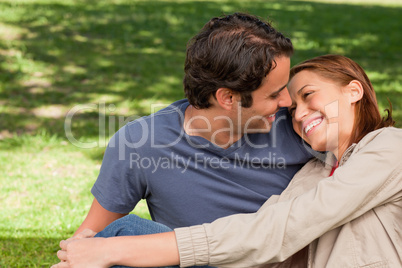 Woman rests her head on her friend's shoulder